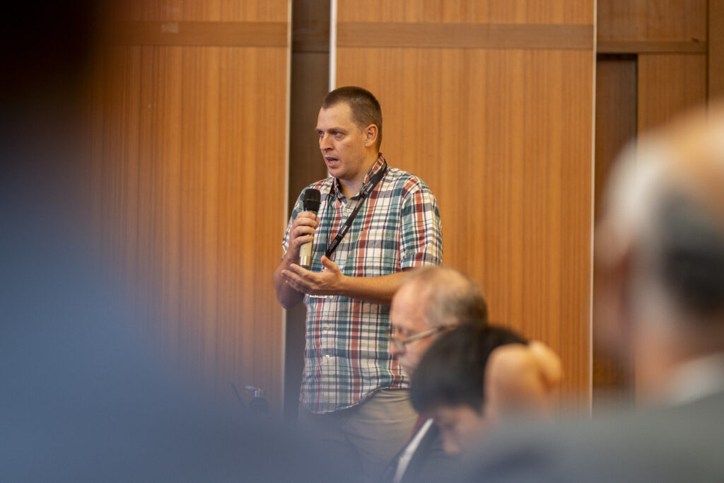 Dr Tim Walmsley in discussion